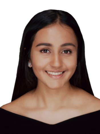 A young woman with long dark brown hair behind her shoulders wears a black off-shoulder top and smiles at the camera in front of a white background.